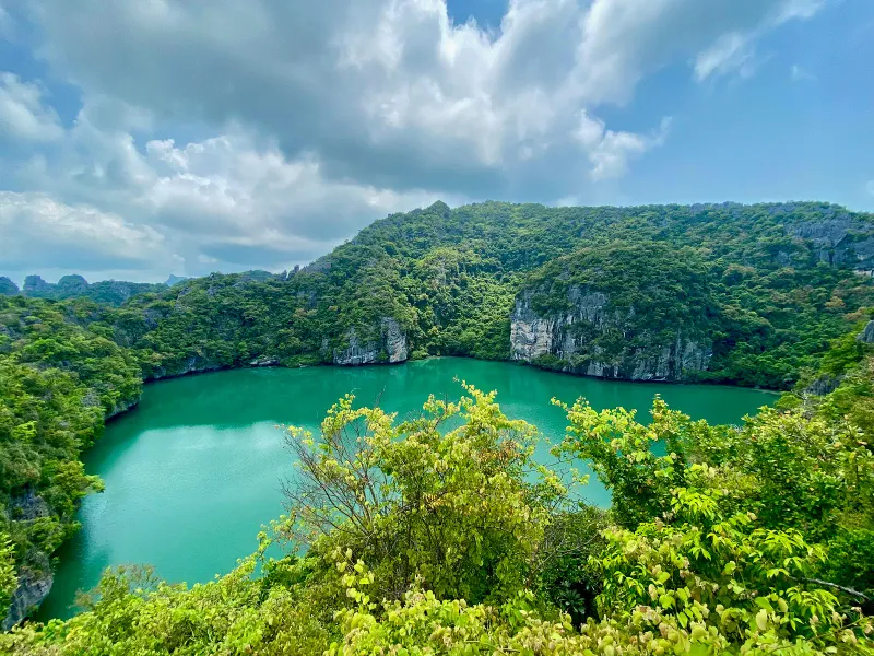 Sea kayaks below the limestone cliffs of Mu Ko Ang Thong