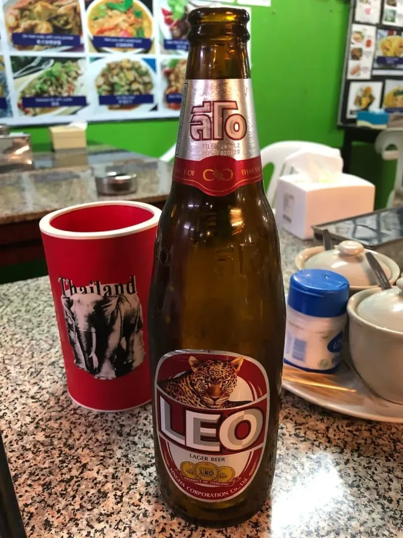 Bottle of Leo beer on a table in a Thai restaurant in Bophut Fisherman's Village