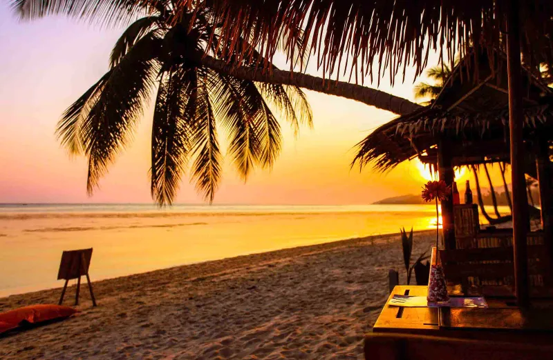 Sunset over the sea on Koh Samui, Thailand, seen from the shore