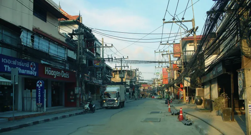 Main road through central Chaweng Beach on Koh Samui lined with shops and hotels