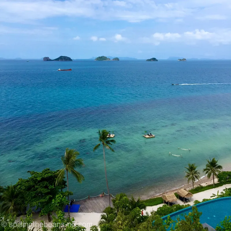 Aerial view of the Conrad Koh Samui beach, jetty, floating deck and Five Islands