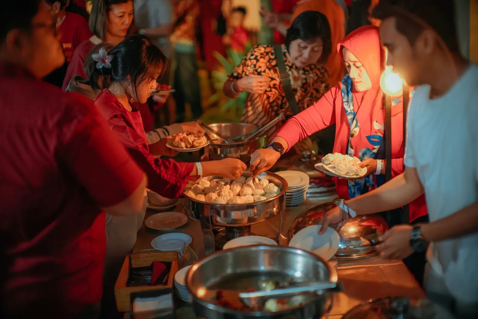 Guests helping themselves at a festive buffet