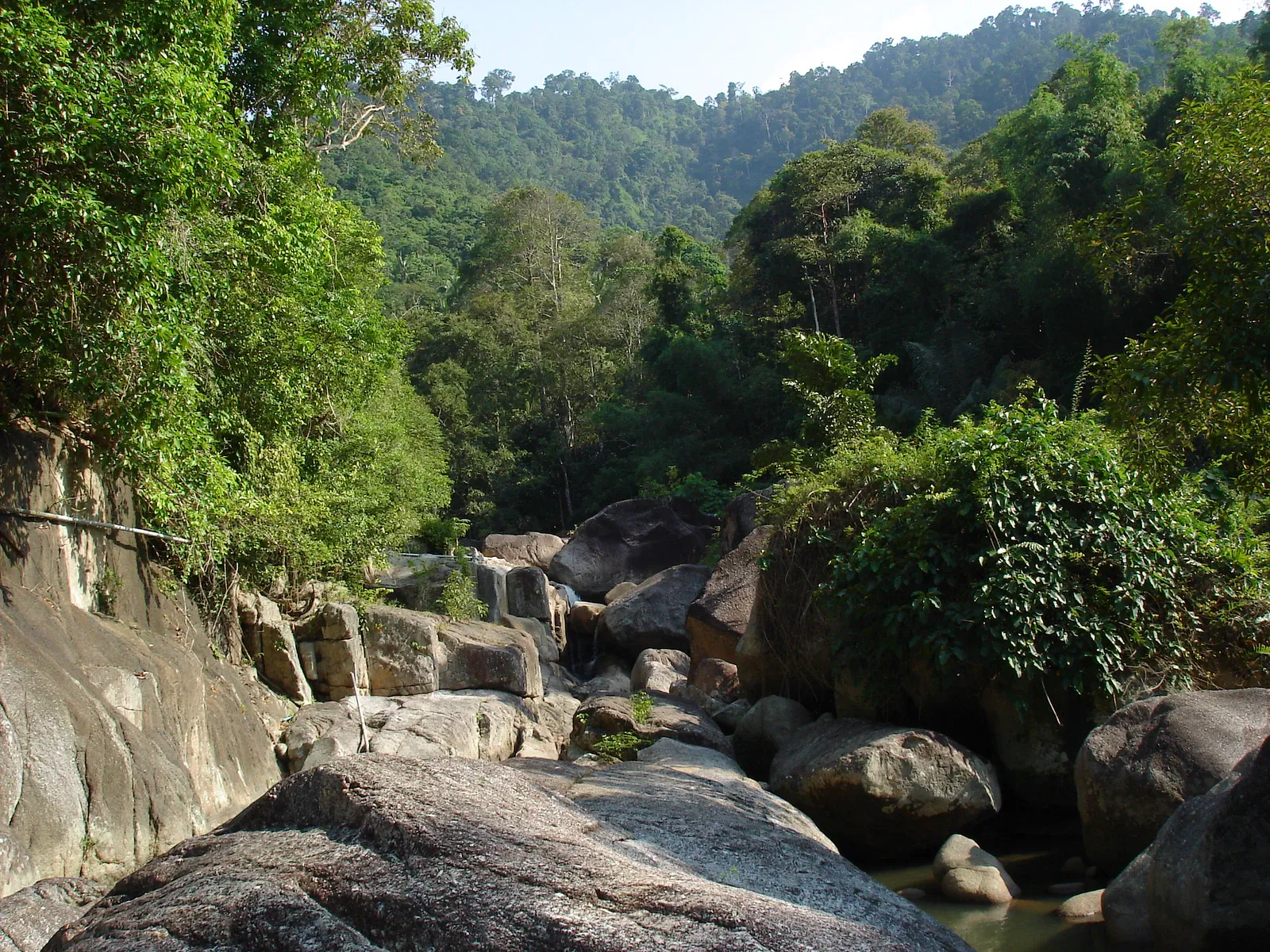 Multi-tiered pools at Hin Lad Waterfall, the trail's destination