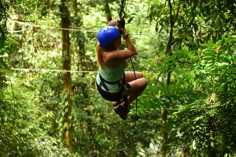 A zipline rider in the jungle
