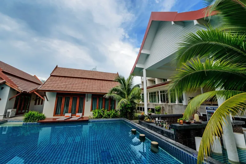 Private pool villa terrace on Koh Samui at dusk
