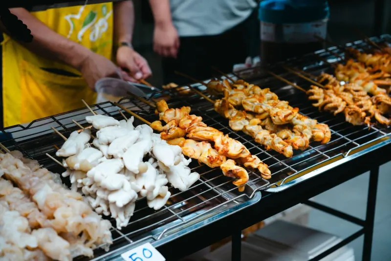 Skewers on a street food grill