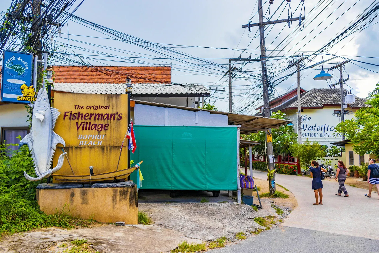 Entrance sign and street of Fisherman's Village in Bophut, Koh Samui, home of the Friday walking street