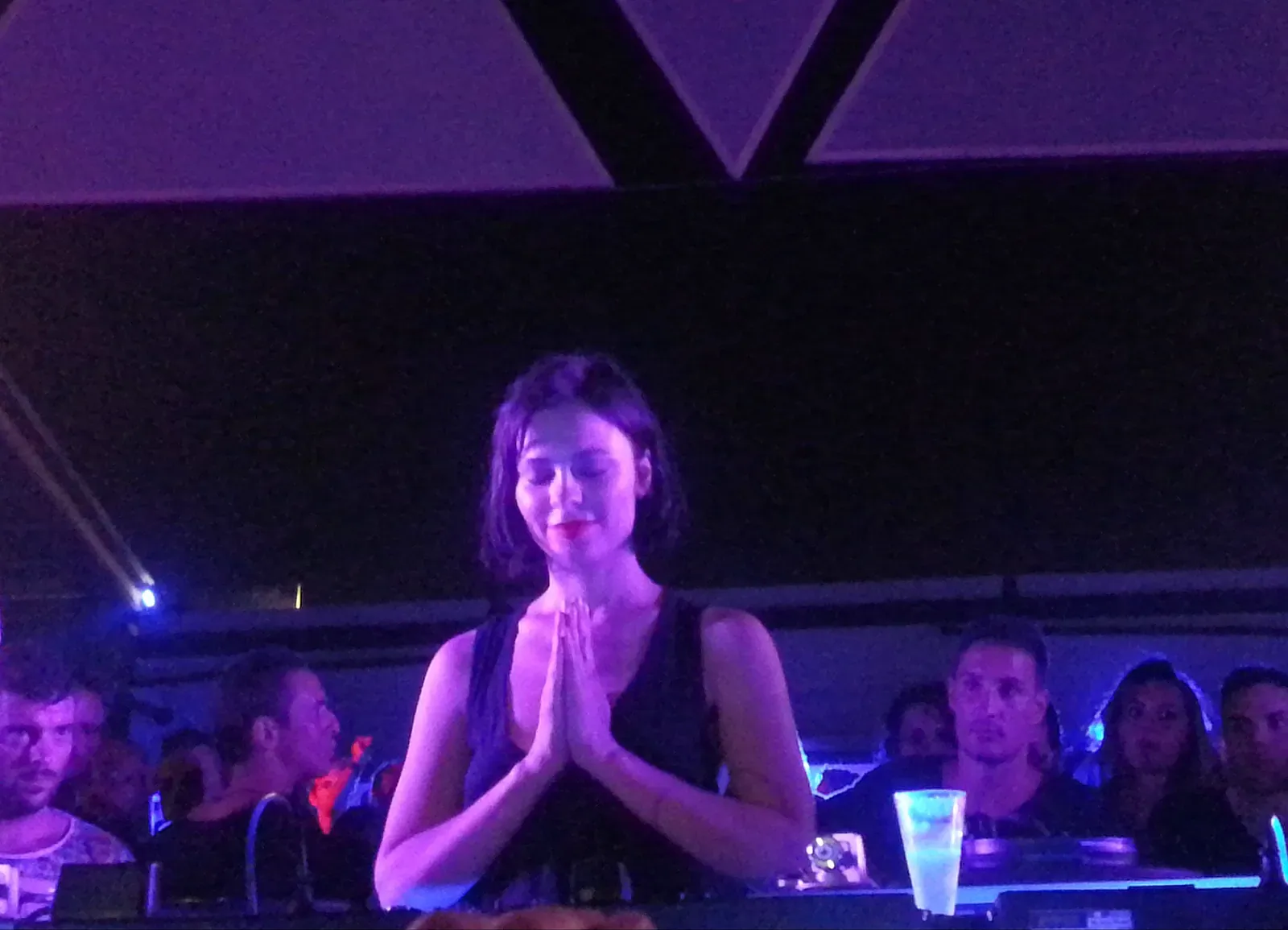 DJ Nina Kraviz performing in a club