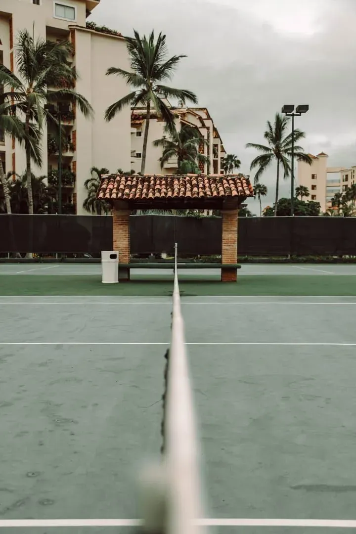 Tropical court with a shaded courtside shed, generic illustration of an open-air court setup on Koh Samui
