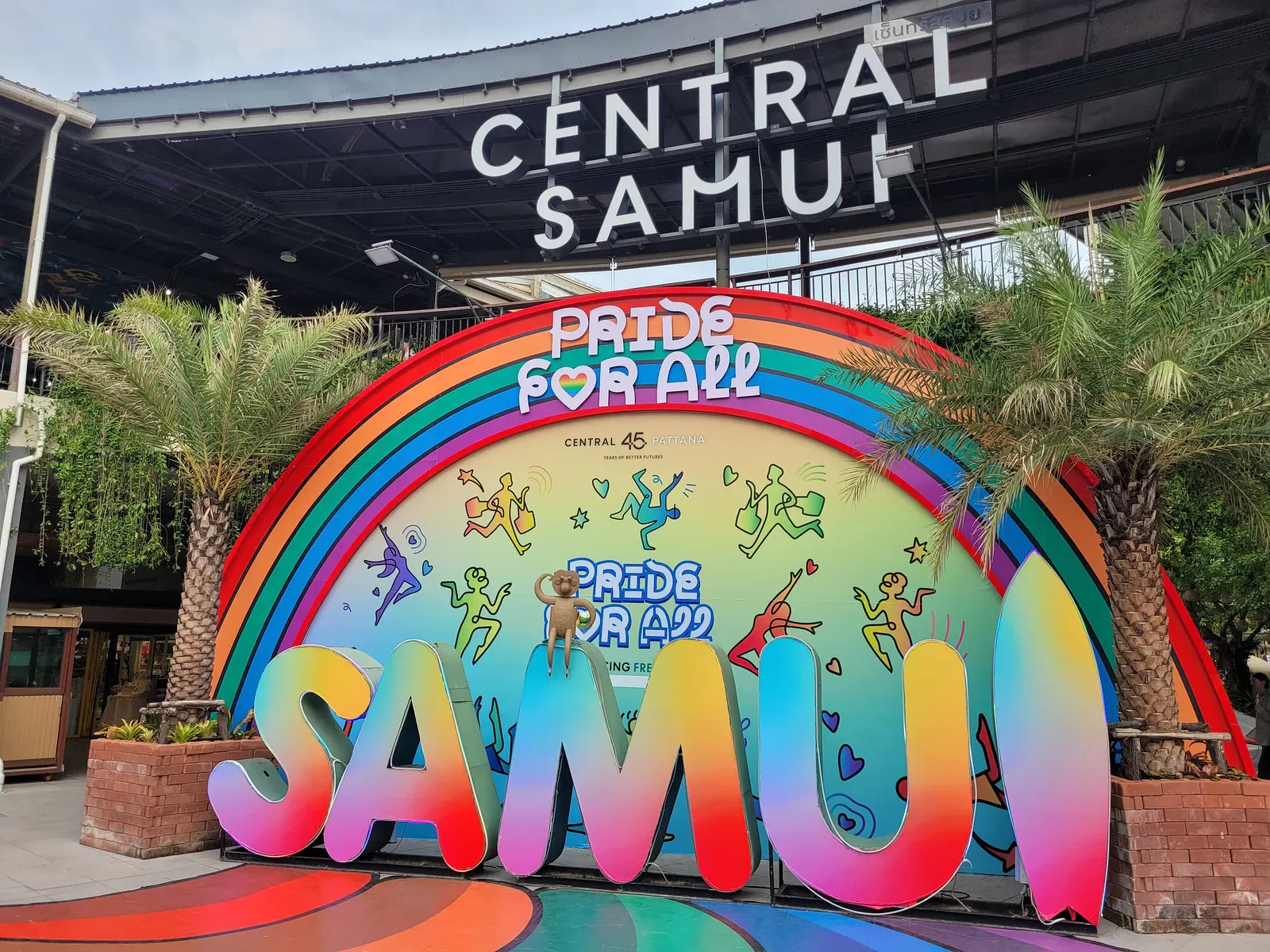 Rainbow Pride for All sign spelling Samui outside Central Samui mall
