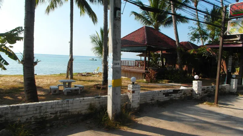 Wat Sila Ngu's red ordination hall on the Hua Thanon clifftop, Koh Samui