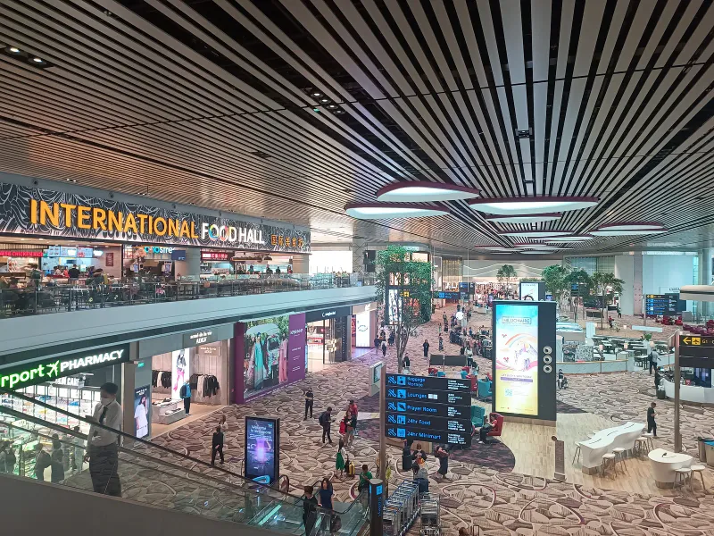 Singapore Changi Airport departure hall interior, the main connecting hub for flights from Australia to Koh Samui
